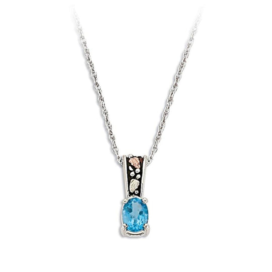 Sterling Silver Black Hills Gold Antiqued Blue Topaz Pendant - Jewelry