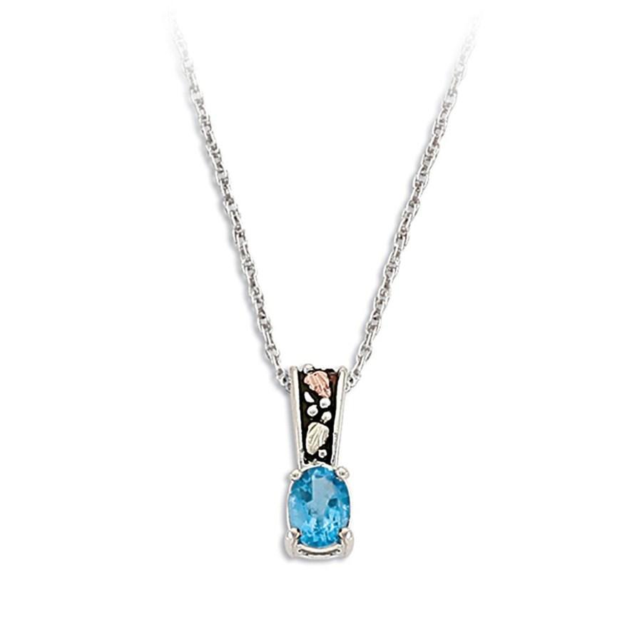 Sterling Silver Black Hills Gold Antiqued Blue Topaz Pendant - Jewelry