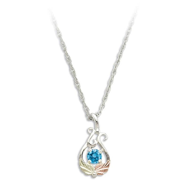 Sterling Silver Black Hills Gold Round Blue Zircon Pendant - Jewelry